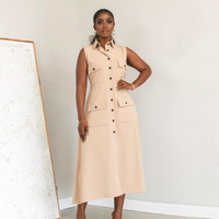 Vêtements pour femmes doux tempérament frais élégant revers sans manches simple boutonnage poche plaquée taille haute Cardigan dames robe