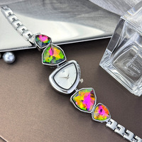 Bracelet de montre en diamant irrégulier populaire, montre pour femmes tendance, montre à quartz unique incrustée de diamants colorés de niche