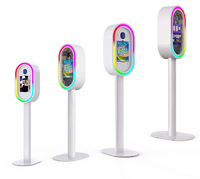 Photobooth DSLR à utilisation facile avec support flash supérieur, lumière LED RGB à télécommande et support iPad, livré avec flight case à roulettes pour festivals