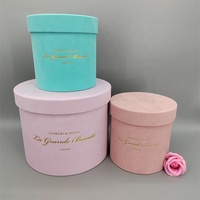 Boîte cadeau de fleurs de luxe personnalisée avec logo en feuille d'or, revêtement UV, laminage mat, carton recyclé, forme ronde