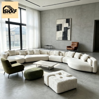 Canapé modulaire en bouclettes courbées, design modulaire, coussins texturés, silhouette arrondie, salon, villa, intérieurs d'hôtellerie