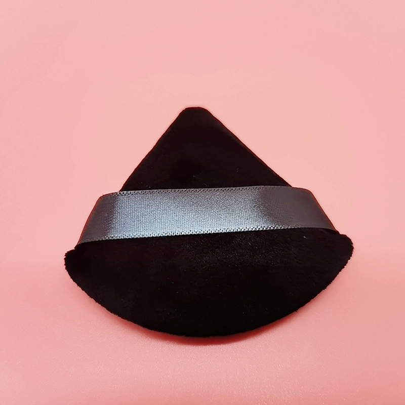 1 borla de maquillaje negra