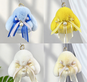Petit lapin en peluche mignon, imitation lapin mort, pendentif porte-clés nœud <span class=keywords><strong>papillon</strong></span>, poupée en fausse fourrure d'otter, décoration de <span class=keywords><strong>sac</strong></span> - Product Image 1