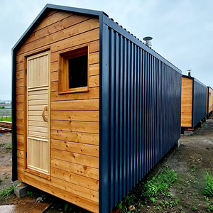 Sauna moderne Polar Armor avec panneaux en aluminium et cèdre rouge pour les températures extrêmes, idéal pour les villas et complexes de luxe haut de gamme. - Product Image 1
