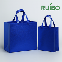 Sac à provisions non tissé personnalisé de haute qualité sac fourre-tout laser bon marché avec longue poignée pour un usage quotidien pour le stockage de vêtements