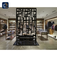 Dernière conception de vitrine métallique de magasin de créateurs, solution d'aménagement de boutique, présentoirs pour vêtements