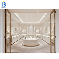Vitrine de présentation de bijoux et de montres personnalisée de luxe multifonctionnelle avec éclairage LED, étanche, durable, en verre trempé incurvé