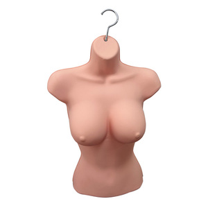 Una percha para ropa diseñada para un torso de maniquí femenino con una espalda ahuecada y ganchos - Product Image 1