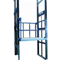 Ascenseur à rail pour marchandises avec cadre en acier renforcé et dispositif de sécurité anti-chute pour le transport de matériaux en usine
