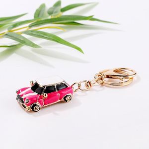 Porte-clés en métal en forme de mini-voiture de dessin animé, avec strass, modèle de voiture, pendentif tendance, décoration pour sac de course, vente en gros - Product Image 5