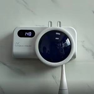 Soportes para cepillos de dientes UVC recargables, montados en la pared, con secador y dispensador de pasta de dientes. - Product Image 3