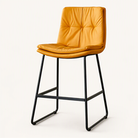 Tabouret de bar et chaise de salle à manger rembourrés jaunes avec dossier, siège rembourré, repose-pieds et structure en métal noir, style contemporain