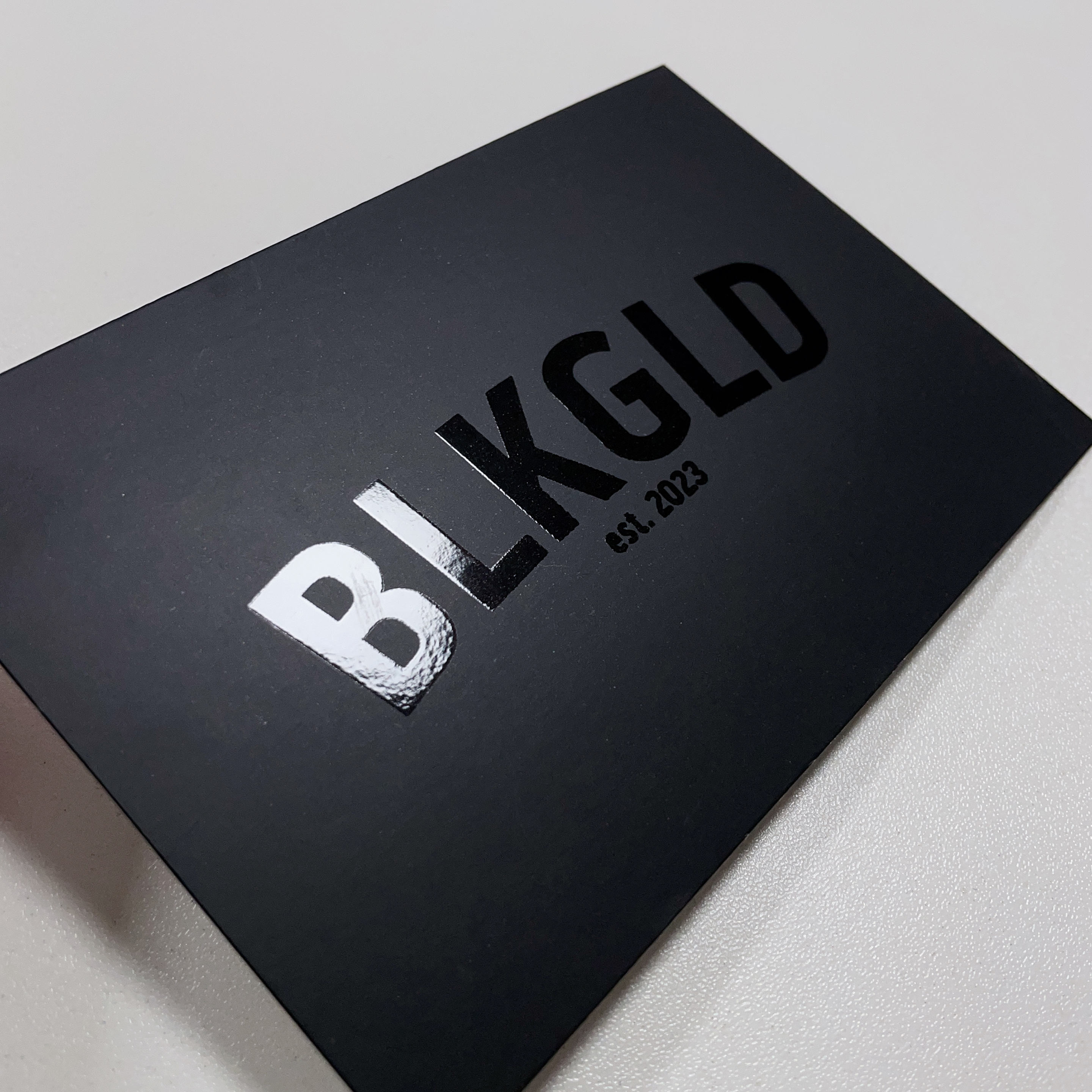 Black card with black UV