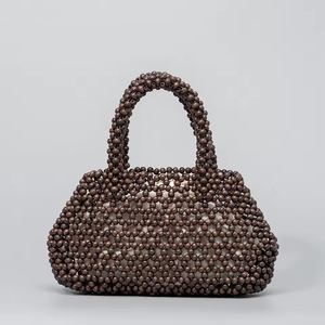 Bolso de madera original de estilo coreano, sencillo y versátil, con diseño calado y tejido artesanal de cuentas, ideal como bolso de playa. - Product Image 3