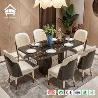 Ensemble de table à manger en marbre noir de luxe avec six chaises en cuir crème pour villa, restaurant, mobilier, solution complète pour toute la maison