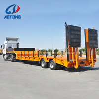 Camion semi-remorque transporteur de conteneurs à grande capacité avec 4 essieux directionnels extensibles et système de levage hydraulique