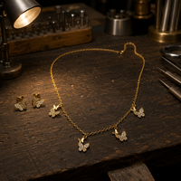 Ensemble collier et boucles d'oreilles papillon à 5 breloques |   Ensemble de bijoux 2 pièces