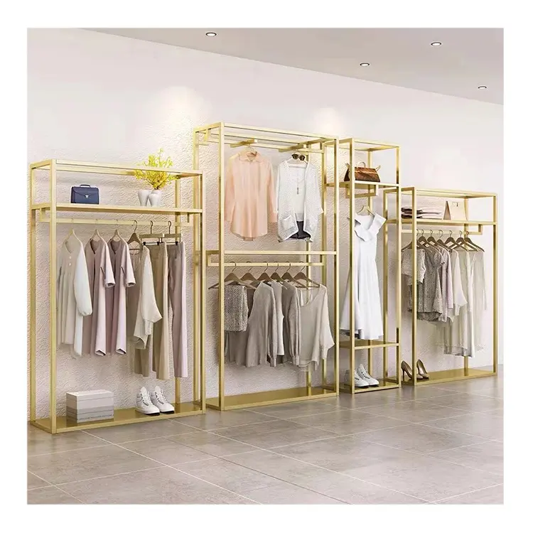 Espositore per abbigliamento moderno in metallo di fascia alta per negozio di abbigliamento femminile personalizzazione espositore