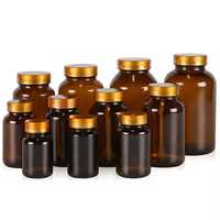 Bouteille de médecine en verre ambré pharmaceutique de 60ml contenant de capsules à large ouverture avec bouchon à vis en aluminium pour perfusion