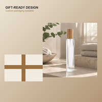 Flacon de parfum rond en verre transparent personnalisé de 100 ml, pulvérisateur à vis XB150, bouchon en bambou, emballage de parfum de luxe rechargeable, logo OEM