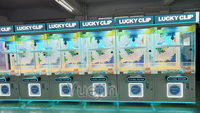 Machine de jeu de grue de griffe de jouet en peluche d'intérieur à jetons 220V Mini équipement d'amusement cadeau parfait pour les enfants et les adultes