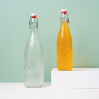 Bouteille en verre ronde transparente de 1L avec bouchon basculant pour brassage artisanal et stockage de bière à domicile – Vente en gros