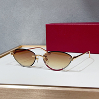Lunettes de soleil de luxe pour femmes, style œil de chat, sans monture, monture en métal doré, verres dégradés, protection UV400, pour les vacances, mode vintage