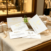 Cartes de visite personnalisées minimalistes avec logo en feuille d'or naturelle et gaufrage, coupon de réduction