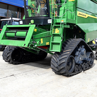 Moissonneuse-batteuse Kangtui OEM à chenilles en caoutchouc triangulaires, faible compactage du sol, haute efficacité sur le terrain, fonctionnement stable sur le terrain