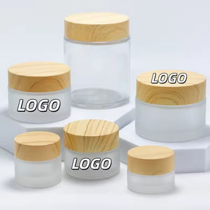 Envase Cosmético de Vidrio Esmerilado de 50g con Tapa de Color Madera, Frasco Redondo de Vidrio con Etiqueta Personalizada para Crema Cosmética - Product Image 1
