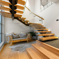 Escalier flottant préfabriqué moderne en acier au carbone à poutre unique avec marches en bois de hêtre/chêne – Conception d'escalier intérieur pour maisons