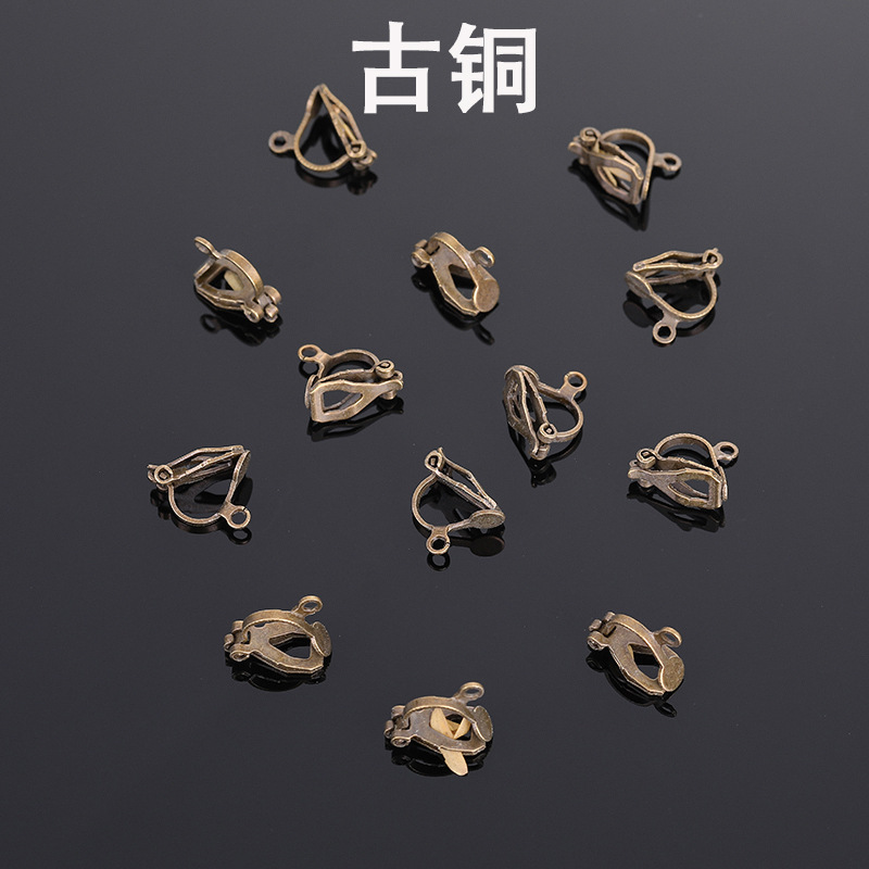Clips triangulares para las orejas, bronce