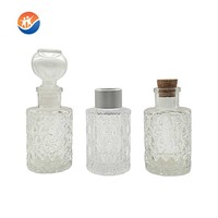 Diffuseur de parfum d'ambiance en verre cylindrique gaufré de haute qualité avec bouchon couronne et bâtonnets diffuseurs
