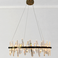 Grand lustre circulaire en cristal avec source LED dimmable et cadre en laiton brossé pour espaces résidentiels