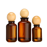 Flacon de parfum en verre ambré de luxe, forme élégante, 30 ml, 50 ml, 100 ml, avec bouchons en bambou pour cosmétiques et parfums