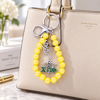 Pendentif Caducée fait main en perles jaunes avec inscription grecque EST 1932 pour la sororité Chi Eta Phi, idéal pour la confection de sacs et de porte-clés