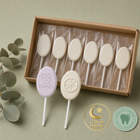 Fabricant OEM de sucettes halal au xylitol, formes plates personnalisées, boules rondes et sucettes pour enfants à motifs de dessins animés, bonbons durs sous marque privée