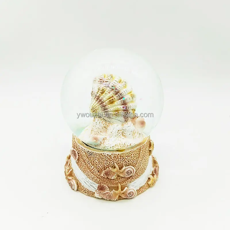 Famoso Souvenir turistico della grecia regali palla di neve all'ingrosso barcellona Seaside Shell Snowglobe Glitter Polyresin Water Globe