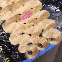 Vente en gros 613 faisceaux de cheveux humains vierges 10a tissages de cheveux humains brésiliens extensions de vague de corps faisceaux de cheveux blonds