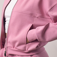 Blouson aviateur de gymnastique avec logo personnalisé pour femmes coupe ample fermeture éclair haut court actif coton poches coupe sèche respirant plaine veste de sport vierge