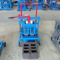 Petite machine manuelle de fabrication de briques à imbriquer en ciment utilisée machine à blocs de terre comprimée moule production de briques à cendres volantes vibration