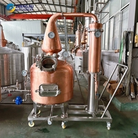 Alambic en cuivre pur ZJ 250L avec plaques filtrantes, adapté aux liquides et aux matériaux fermentés solides, pour la distillation de spiritueux de qualité supérieure