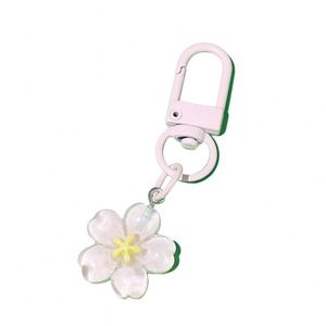 Breloques de sac imperméables pour femmes et filles, porte-clés en résine en forme de fleur de cerisier, breloques de clés en plastique - Product Image 1
