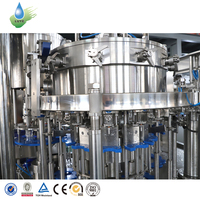 Machine de remplissage CSD contrôlée par PLC 4000 bph, système d'embouteillage automatisé de boissons gazeuses pour usine de boissons gazeuses