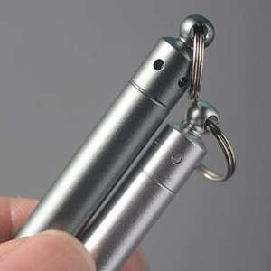 Cure-oreille portable en acier inoxydable, outil de nettoyage d'oreilles rétractable avec trou pour accrocher des porte-clés. - Product Image 4