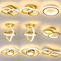 Plafonnier LED géométrique moderne en or avec anneaux entrelacés en acrylique pour salon