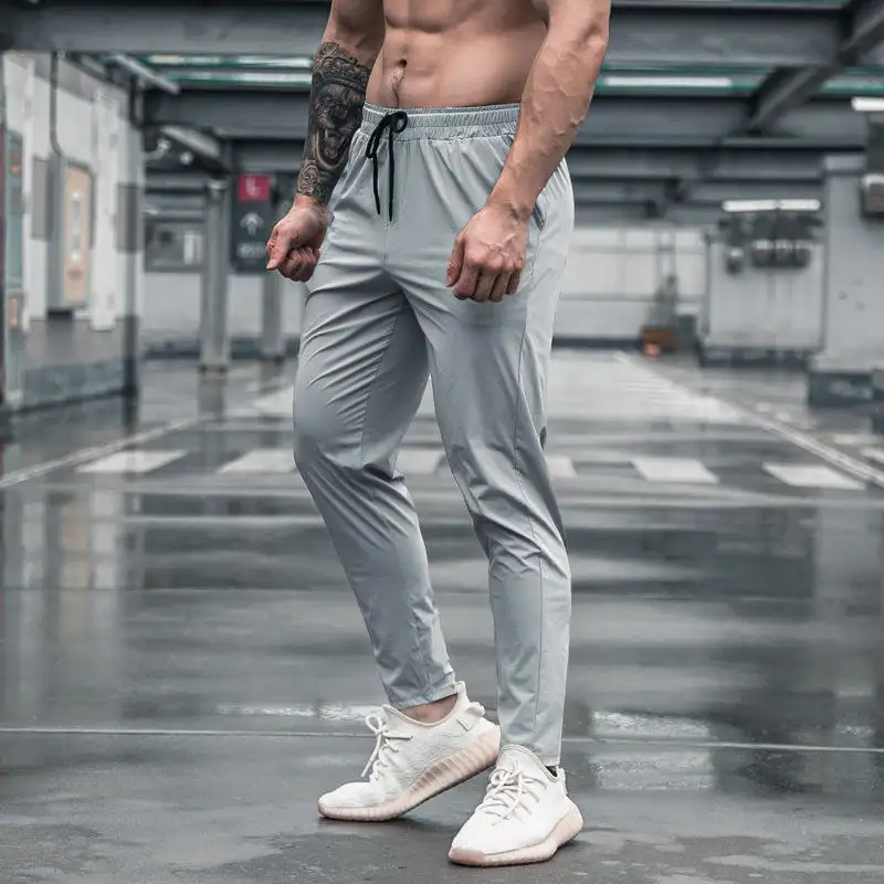 Gym Jogger Sweatpants Men Running Dry Fit Slim Bodybuilding Men's Sports Trousers Stretchy Fitness Training Pants