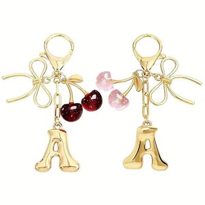 Llavero Metálico Retro con Letra Burbuja y Lazo Decorativo, Color Rosa Cereza, Ideal para Colgante de Bolso de Mujer, Regalo, Venta al por Mayor - Product Image 1