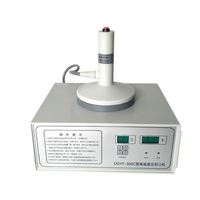 Máquina de sellado de juntas de sellado de papel de inducción manual, máquina de sellado de tarros