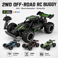 Voiture RC tout-terrain 2.4GHz 2WD télécommandée avec deux batteries, amortisseurs et pneus en caoutchouc